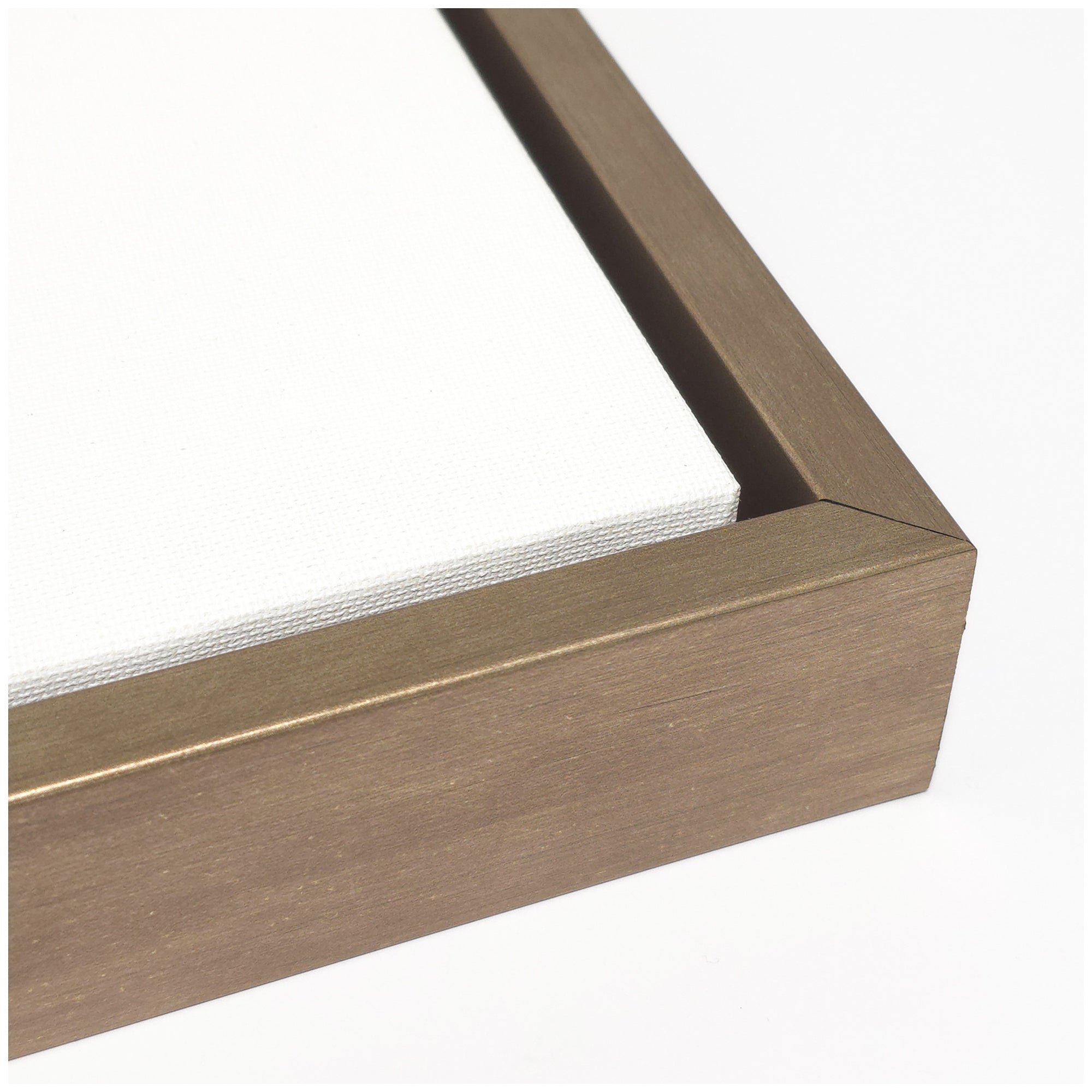 Close-up of a gold picture frame corner on a white background