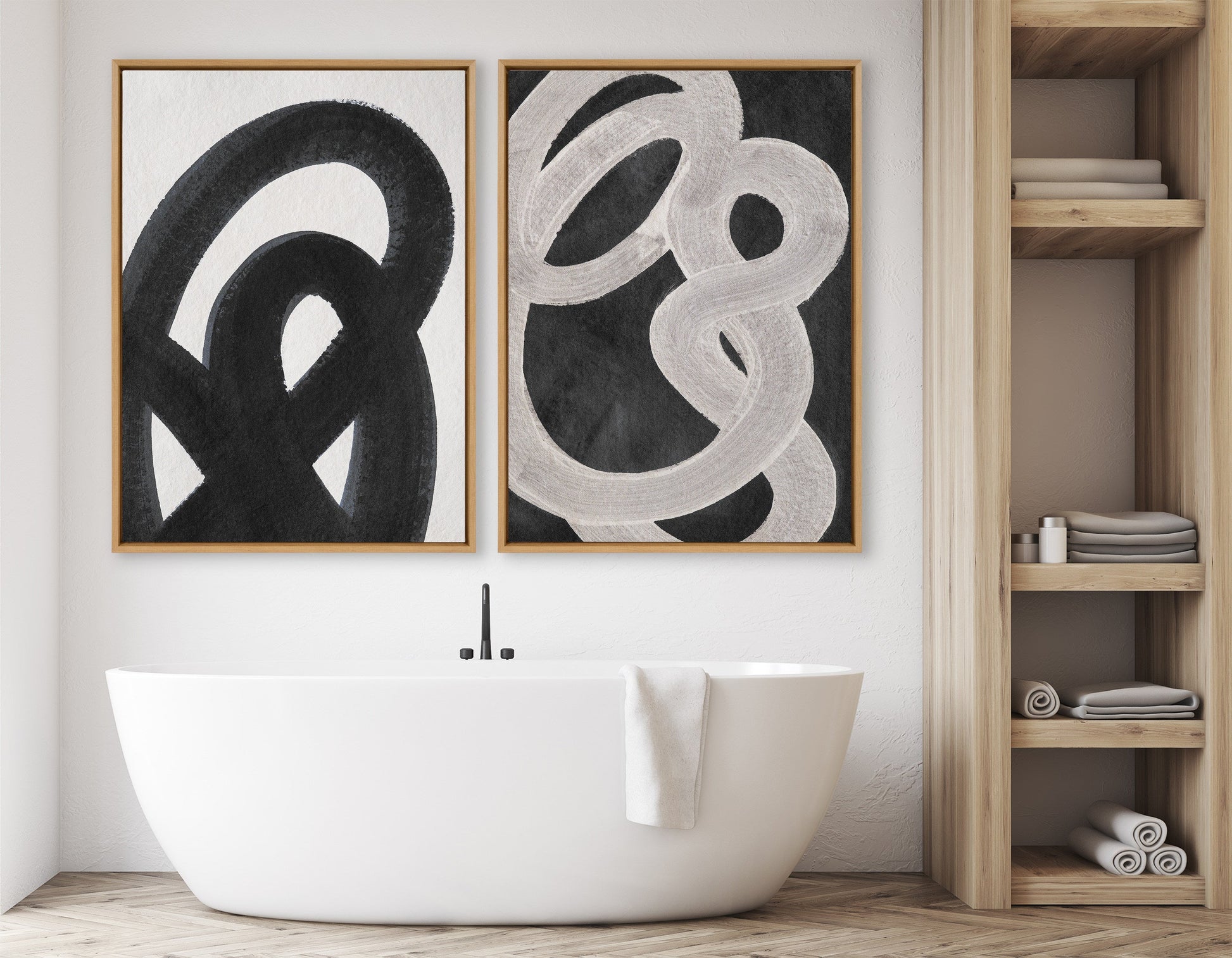 Bathroom interior with abstract art on the wall and a freestanding bathtub.