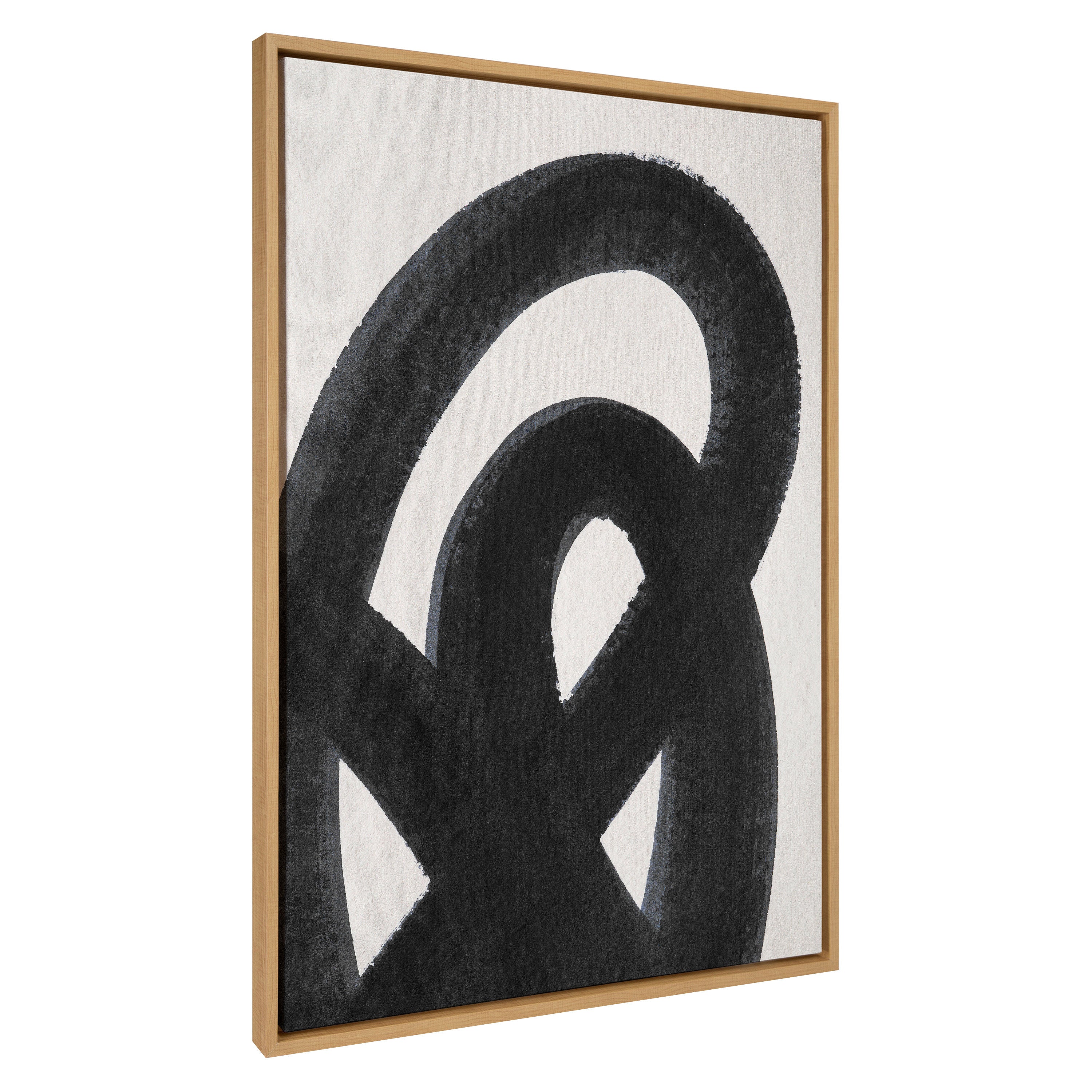 Abstract art piece with black and white design in a gold frame on a white background
