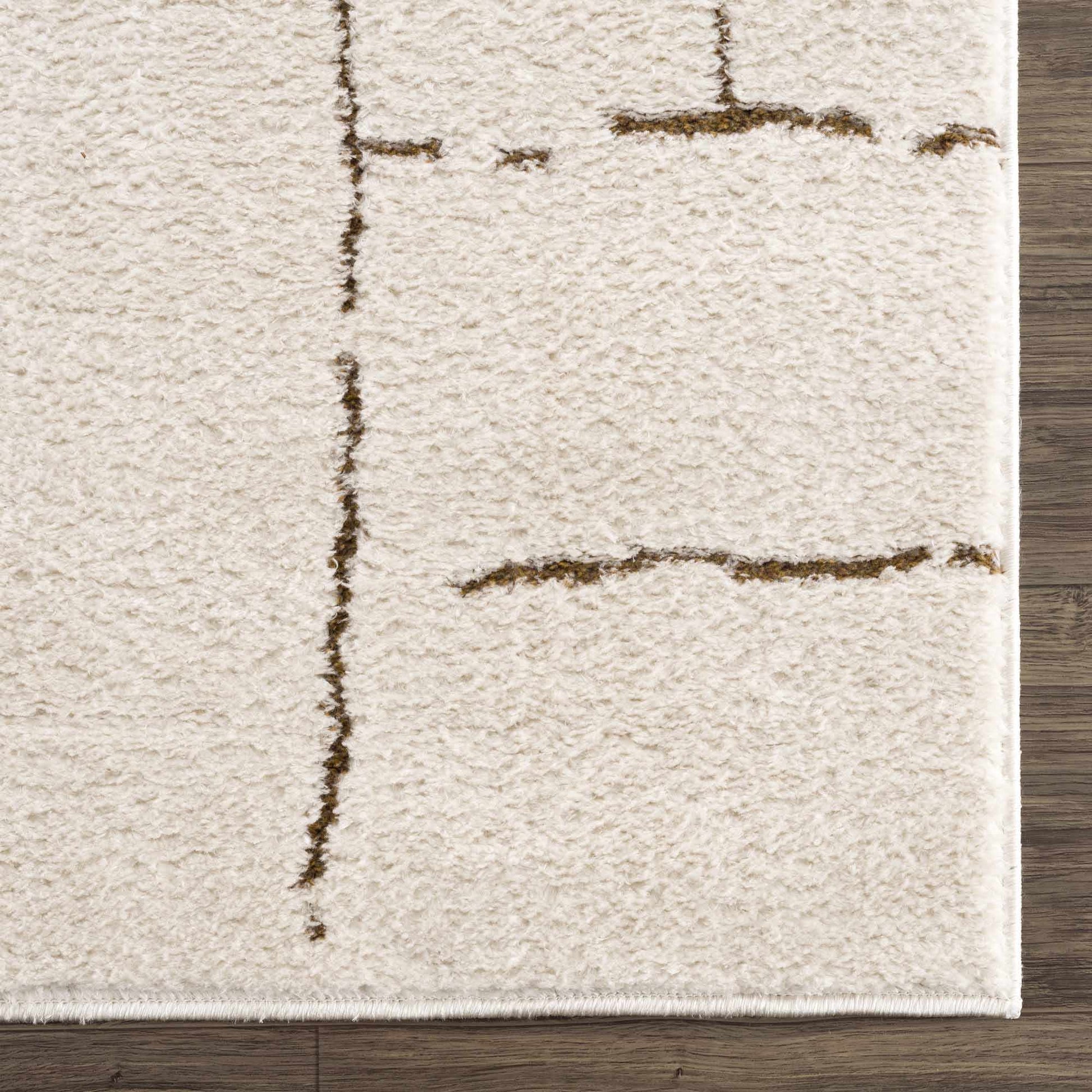 Textured area rug with abstract brown patterns on a wooden floor