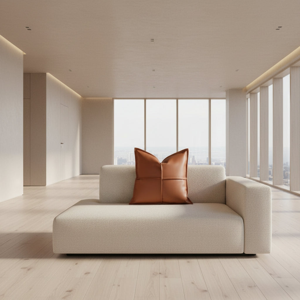 Brown leather pillow on a white background